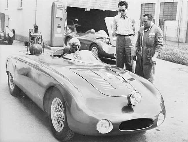 The great Louis Chiron getting ready for a pre 1956 Mille Miglia test run. Overlooked by the Italian champion Umberto Maglioli